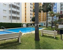Luminoso apartamento con terraza, garaje y piscina en Playa de Gandía