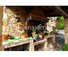 Casa de piedra situada en la urbanización Can Manel en Castell d´Aro