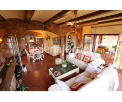 Casa de piedra situada en la urbanización Can Manel en Castell d´Aro
