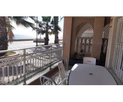 Vivienda 3 dormitorios y dos baños en planta baja con garaje y sótano frente al mar en Villaricos.