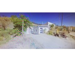 Parcela Urbana de 2000 mt con vivienda y almacén en El Puertecico, Huércal Overa