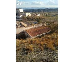 Parcela Urbana de 2000 mt con vivienda y almacén en El Puertecico, Huércal Overa