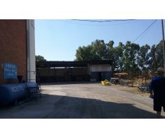 terreno industrial con talleres