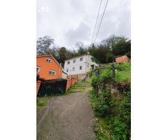 Edificio de dos viviendas en Turón, Asturias: Tu Oportunidad Ideal