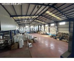 nave industrial al lado de la A7