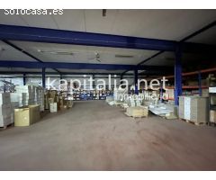 nave industrial al lado de la A7