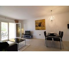 Apartamento de 2 dormitorios en Benissa Costa, con piscina comunitaria y vistas parciales al mar, a 